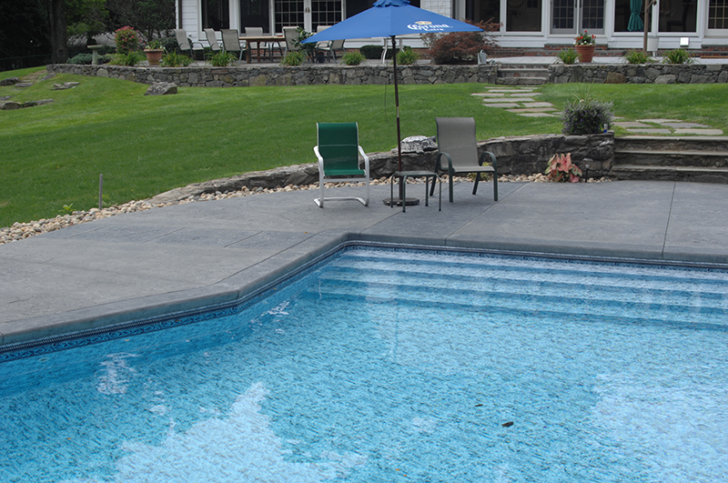 Swimming pool and stamped concrete project example 94